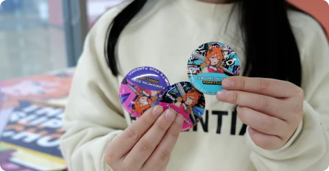 Button pins with collaborative designs