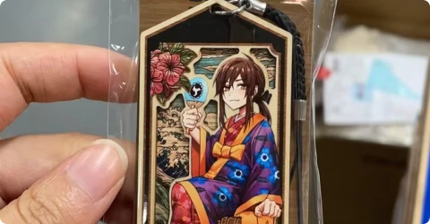 Wooden keychains and back card packaging made by Shizan for Dokomi